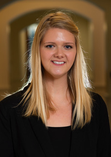Image of woman smiling Nina Cook