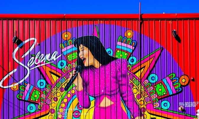 Image of Selena mural on border wall