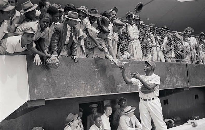 Jackie Robinson greets baseball fans