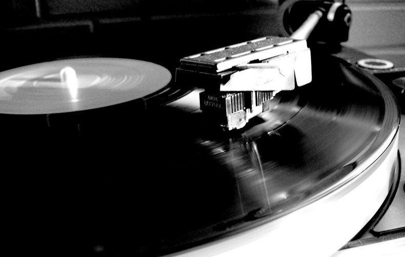 Pop Music in American Culture - A vinyl record being played on a record player